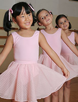 Girls doing ballet in class